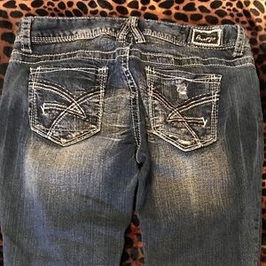 Like New Amethyst Jean Capris